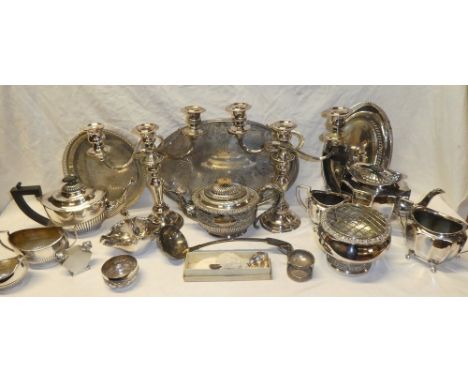 A selection of various silver plated items including three-piece oval tea set, pair of candelabra, ornate oval teapot, trays,