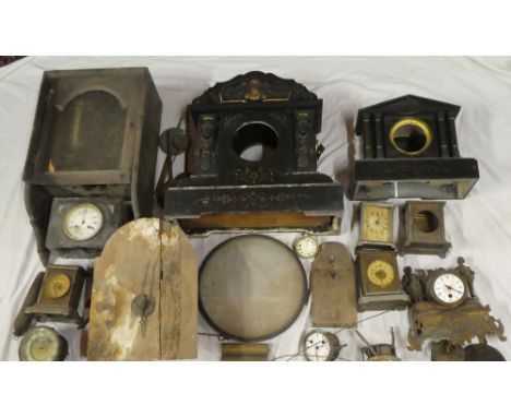 A selection of various mantel clock movements, part Continental wall clock, pendulums, metal cased mantle clocks, two slate m