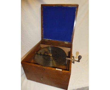 A 19th Century polyphon disc player with 11" disc in replacement oak square case with brass handles