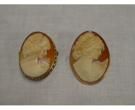 A 14ct gold mounted oval pendant brooch set female portrait cameo and one other 9ct gold oval cameo brooch (2)