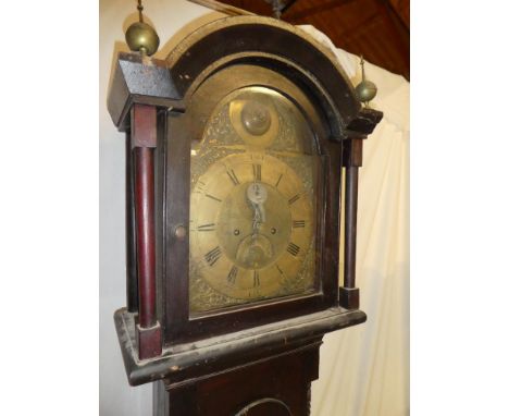 A late 18th/ early 19th Century Cornish longcase clock by William Petherick of St. Austle (St. Austell) with 12" brass arched