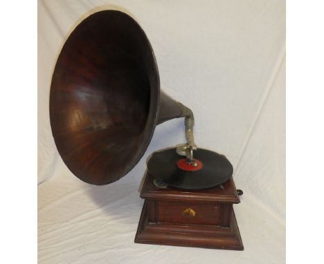 An old HMV mahogany table gramophone with HMV fibre horn