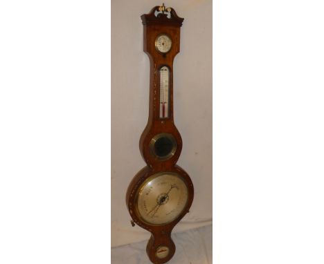 A 19th Century mercury barometer with silvered circular dial below mirror, thermometer and subsidiary dials in inlaid rosewoo