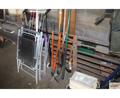 A quantity of long handled tools, including slasher, extendable lopper, pitch fork etc.