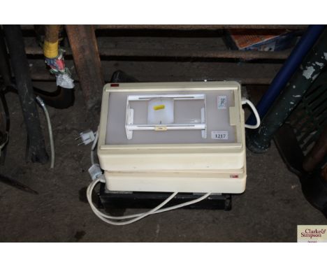 Two light boxes with magnifier and a battery operated twin spot lamp