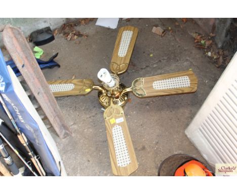 A ceiling light / fan