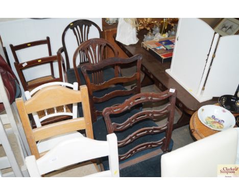 Two Georgian Hepplewhite style dining chairs and a George III ladder back chair
