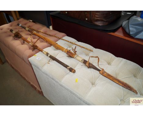 A spear, a club and a swagger stick