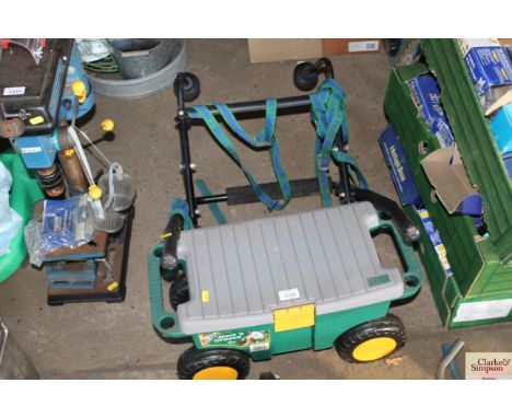A garden trolley tool box / seat and a cycle carrier
