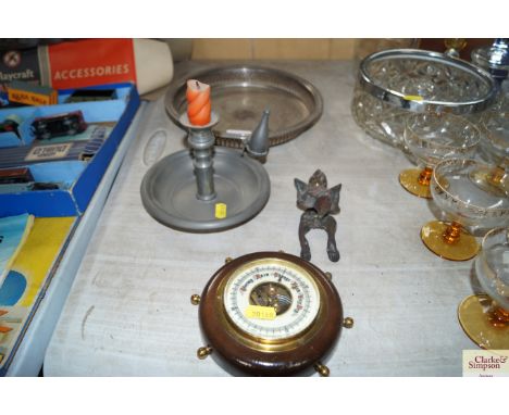 A pewter chamber stick, door knocker in the form of a box, barometer and silver plated tray