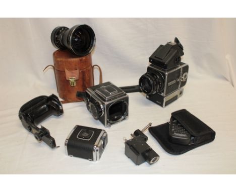 A Hasselblad 500 EL/M camera with Zeiss lens, Hasselblad 500 C/M camera, Zeiss Distagon wide angle lens and various accessori