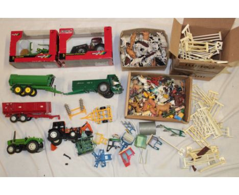A mint and boxed Britain's tractor and bale wrapper, various Britain's farm animals, farm vehicles, gates etc.