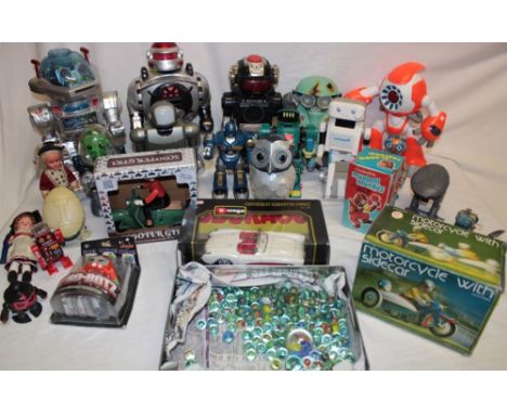 Various toys including modern boxed scooter girl clockwork figure, boxed clockwork musical monkey, boxed motorcycle with side