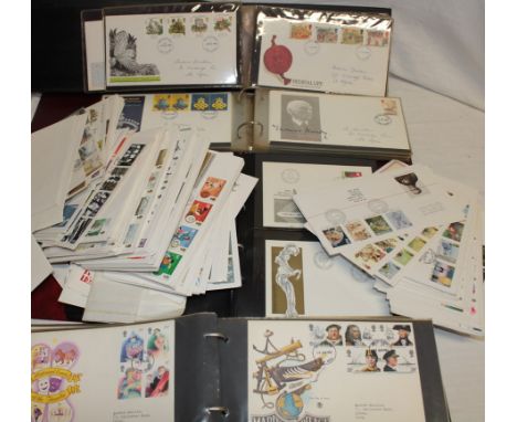 Four albums containing a selection of GB and German first day covers and commemorative covers etc.