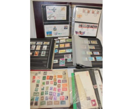 Two stock books containing GB and Commonwealth mint and used stamps, an album containing GB first day covers and others, etc 