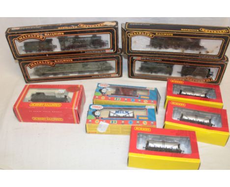 Four Mainline boxed 00 gauge locomotives including Hinton Manor, the Manchester Regiment diesel locomotive etc.; a Hornby 00 