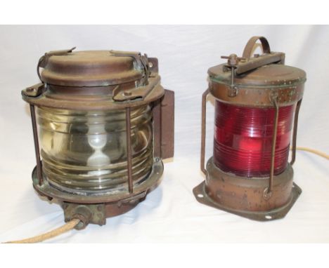 A brass ship's lamp with ribbed circular lens 12" high and one other copper stern lantern with red tinted glass lens (2)