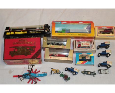 Various boxed  and unboxed diecast vehicles including Ertl Trucks of the World lorry, Matchbox Models of Yesteryear 1936 fire