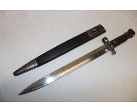 An 1888 pattern Lee Metford bayonet with double edged steel blade by Sanderson of Sheffield, the hilt marked "6 M.X.488" for 