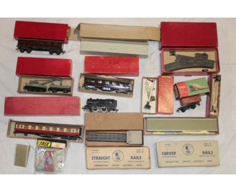 Trix Twin Railway - boxed crane truck, coaches, lamp, platforms, tracks and points, unboxed 0-4-0 tank engine, etc
