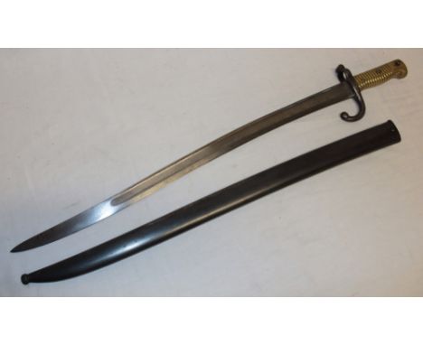 A 19th century French Chassepot bayonet with single edged curved blade dated 1872 in steel scabbard with matching numbers