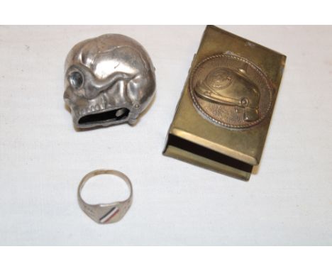 A First War German brass matchbox holder with pickelhaube emblem, German silver patriotic dress ring and a German white metal