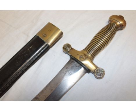 A 19th century French Pioneer's sword with 19" double edged blade by Talarot of Paris in brass mounted leather scabbard