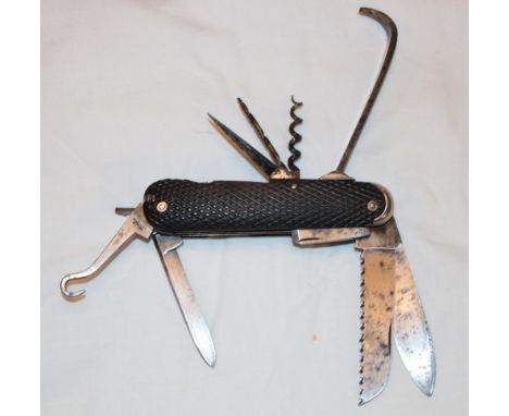 A rare 19th century gentleman's pocket knife by Wells of The Strand London with folding blades, corkscrew, drill, tweezers an