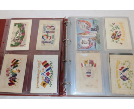 An album of various postcards including 30 First War embroidered silk postcards, military postcards, greetings etc.