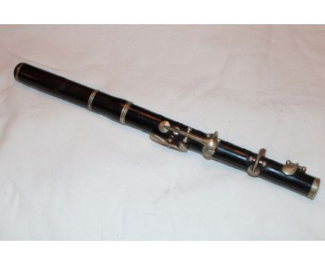 A rosewood miliary piccolo by Starck Barnes & Sons London with broad arrow markings
