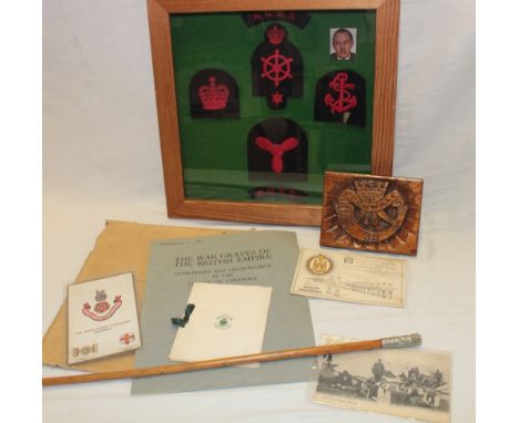A nickel mounted swagger stick of the Royal Artillery, display of badges, carved wood Duke of Cornwall's Light Infantry plaqu