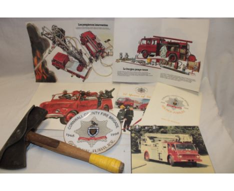 A selection of Cornwall Fire Brigade memorabilia including fireman's axe, Cornwall County Fire Brigade Golden Jubilee plates,