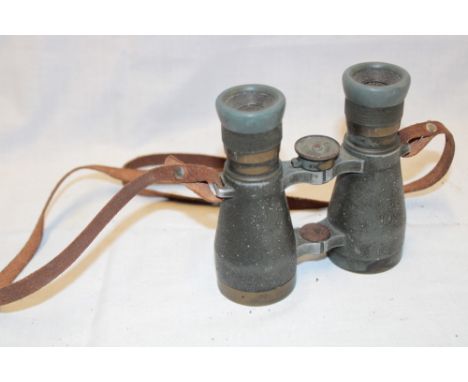 A pair of First War German grey and brass mounted military field binoculars