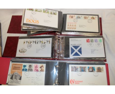 Three albums containing a collection of approximately 130 various GB First Day covers 1948-1998