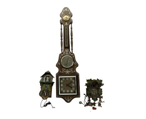 Two Bavarian cuckoo clocks and a modern barometer with clock and thermometer