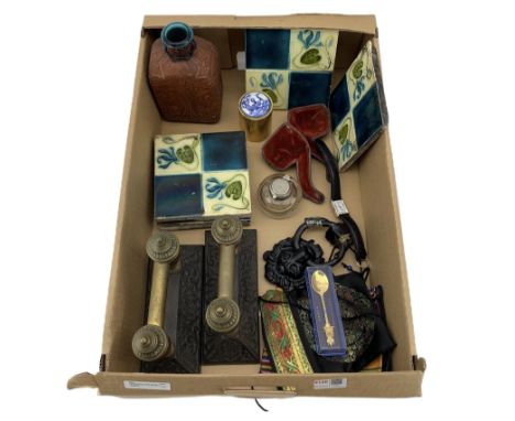 Pair of Victorian brass and cast iron fire dogs, set of six Art Nouveau glazed tiles, glass inkwell and miscellanea in one bo