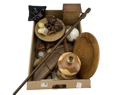 Treen items including a table lamp, carved fuit, plate etc, carved stone eggs and sphere, African walking cane etc in one box