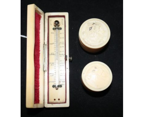 An ivory-cased pocket thermometer and two Meiji Japanese cylindrical boxes and covers.