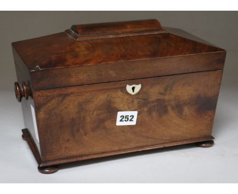 A rosewood tea caddy