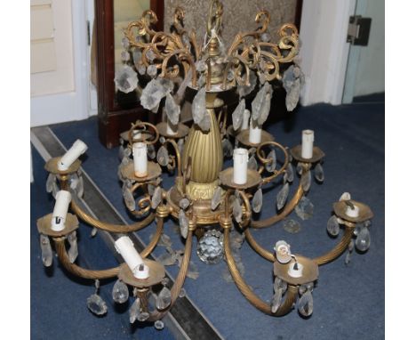 A gilt metal & lustre hung light chandelier