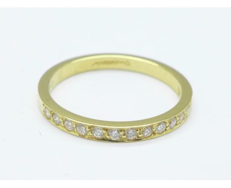 An 18ct gold, fifteen stone diamond ring, approximately 0.30 carat, 2.4g, N