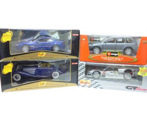 Four 1:18 scale model vehicles, three Maisto and one Burago, Mercedes-Benz 500K and SL-Class, CLK-GTR and VW Toureg