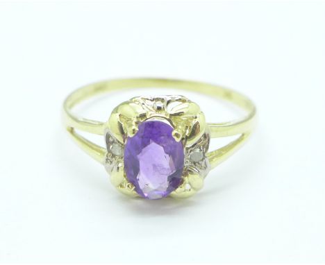 A 9ct gold, amethyst and diamond ring, 1g, O