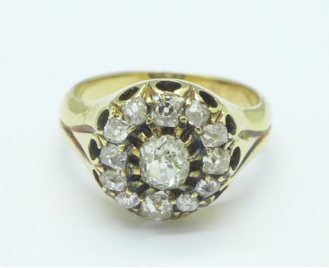 A yellow metal and diamond cluster ring, approximately 1.25carat, 6.3g, O