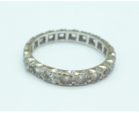 A 9ct white gold and clear stone eternity ring, 1.8g, K