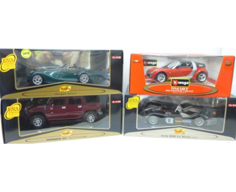 Four 1:18 scale model vehicles, three Maisto and one Burago, Morgan Aero 8, Hummer, Audi R8R Le Mans and Smart Roadster