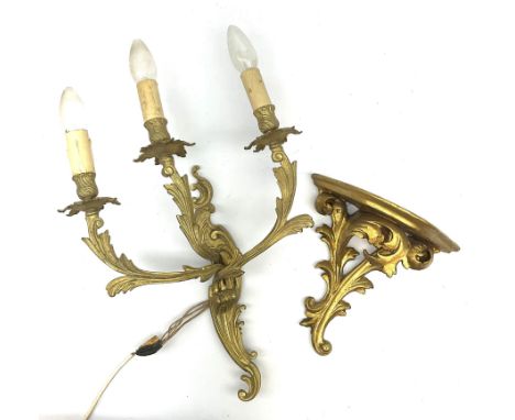 A Rococo style gilt metal three branch wall sconce wall light, H40cm, together with a gilt wall sconce or bracket, the suppor