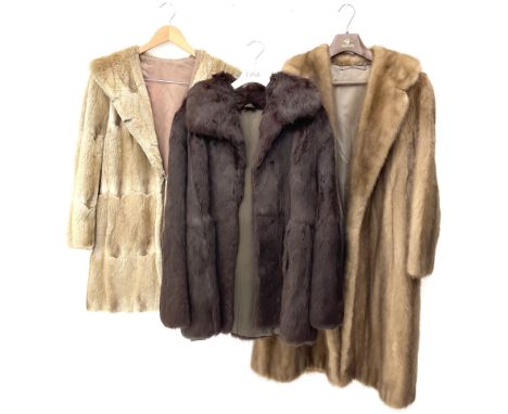 Ladies full length light brown mink fur coat, together with a ladies short dark brown rabbit fur coat and a ladies mid length