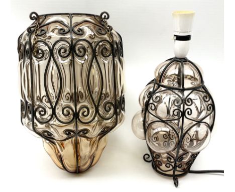 Continental glass ceiling light encased in an iron frame with scroll design H35cm, along with a matching table lamp H35cm, wi