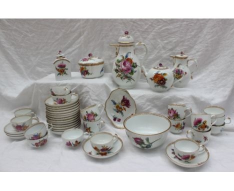 A Meissen porcelain part tea and coffee service, with a gilt rim each piece painted with various sprays of garden flowers, co